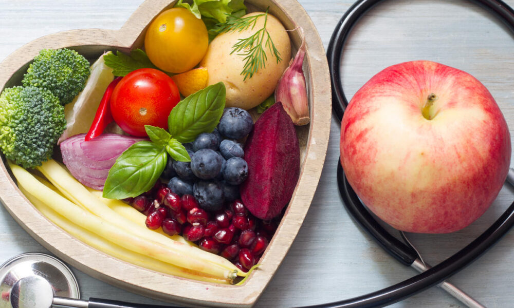 Healthy food in heart diet concept with stethoscope